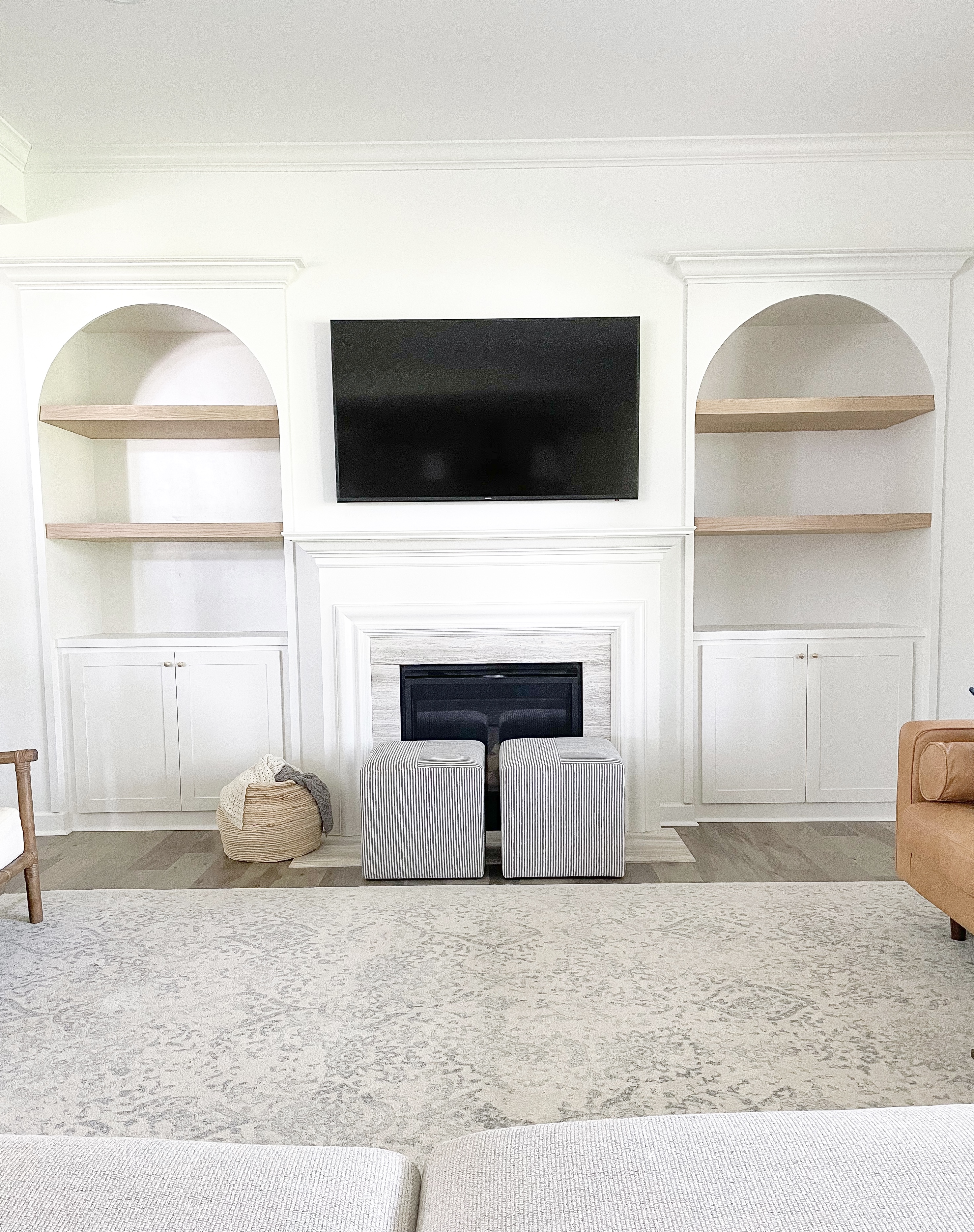 Family room arched built in shelves