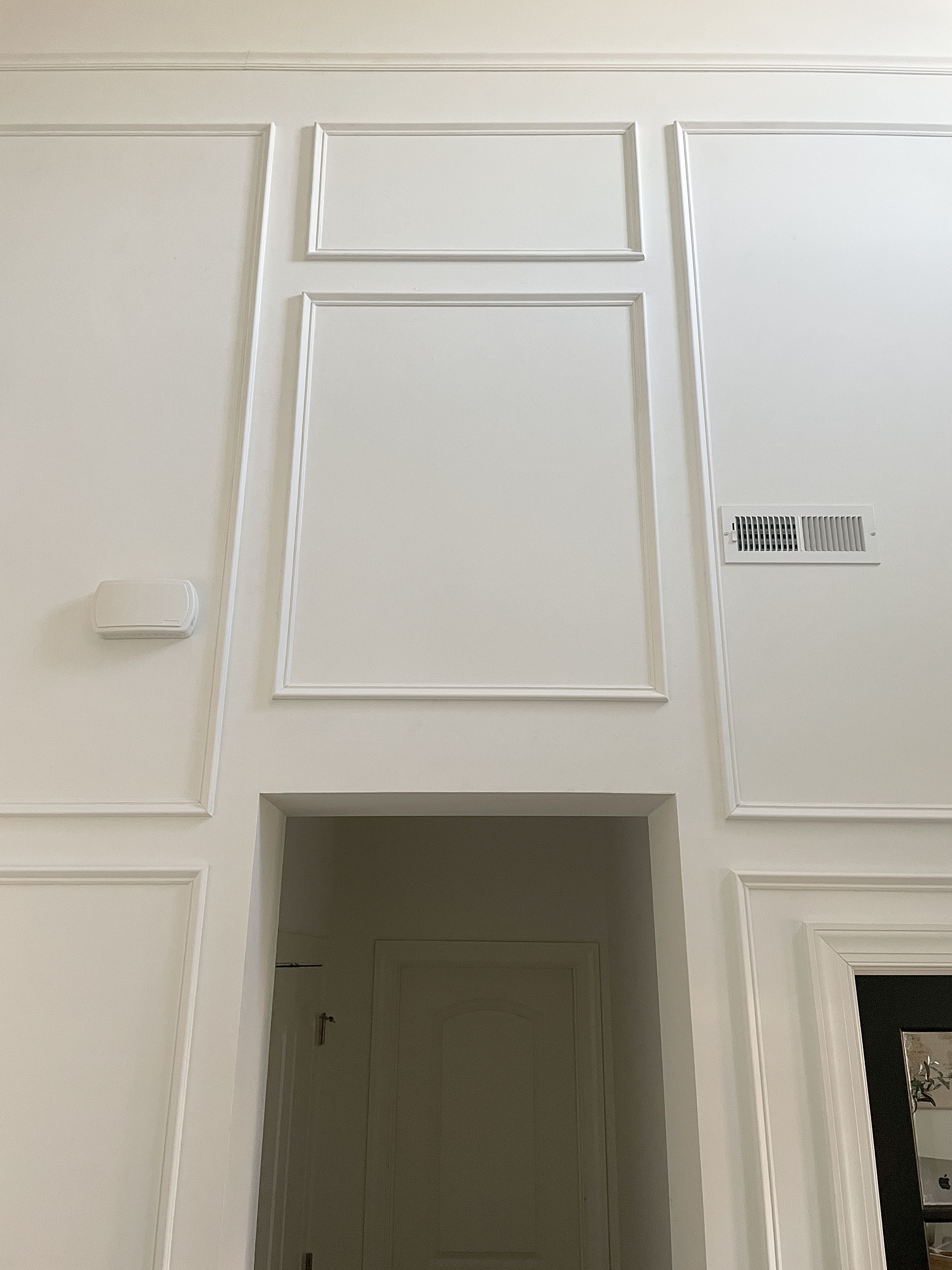 picture frame molding on white wall