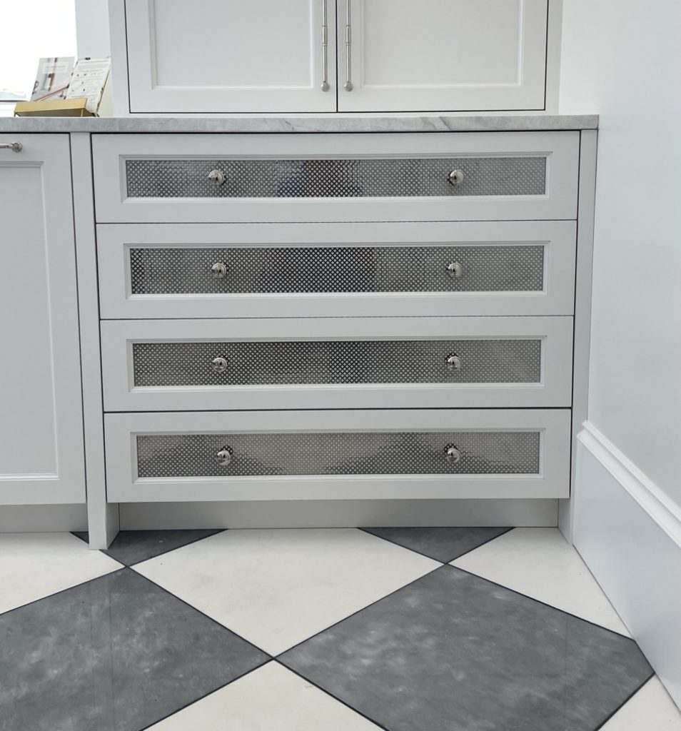 laundry room cabinets with checkered marble tile floors with metal 
