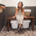 diy mom sitting on a table she got a thrift store and stained dark on brick herringbone floors
